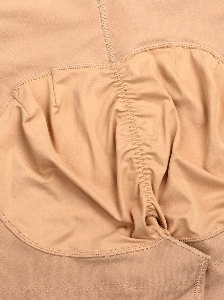 Gaine intégrale avec panneau abdominal en latex