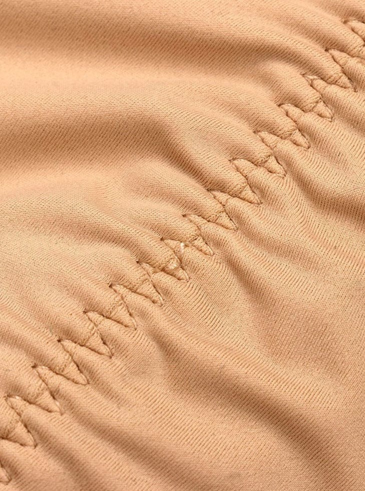 Gaine intégrale avec panneau abdominal en latex