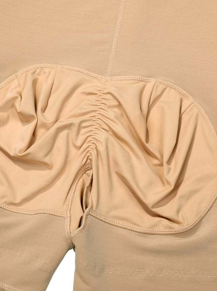 Gaine intégrale à maintien abdominal et bordures antiglisse