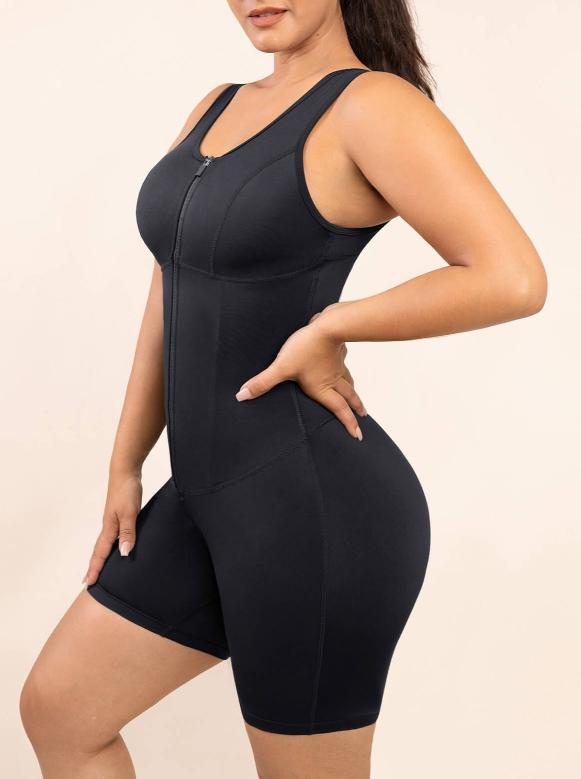 MT220085 — Combinaison gainante de sport doublée de latex avec zip avant